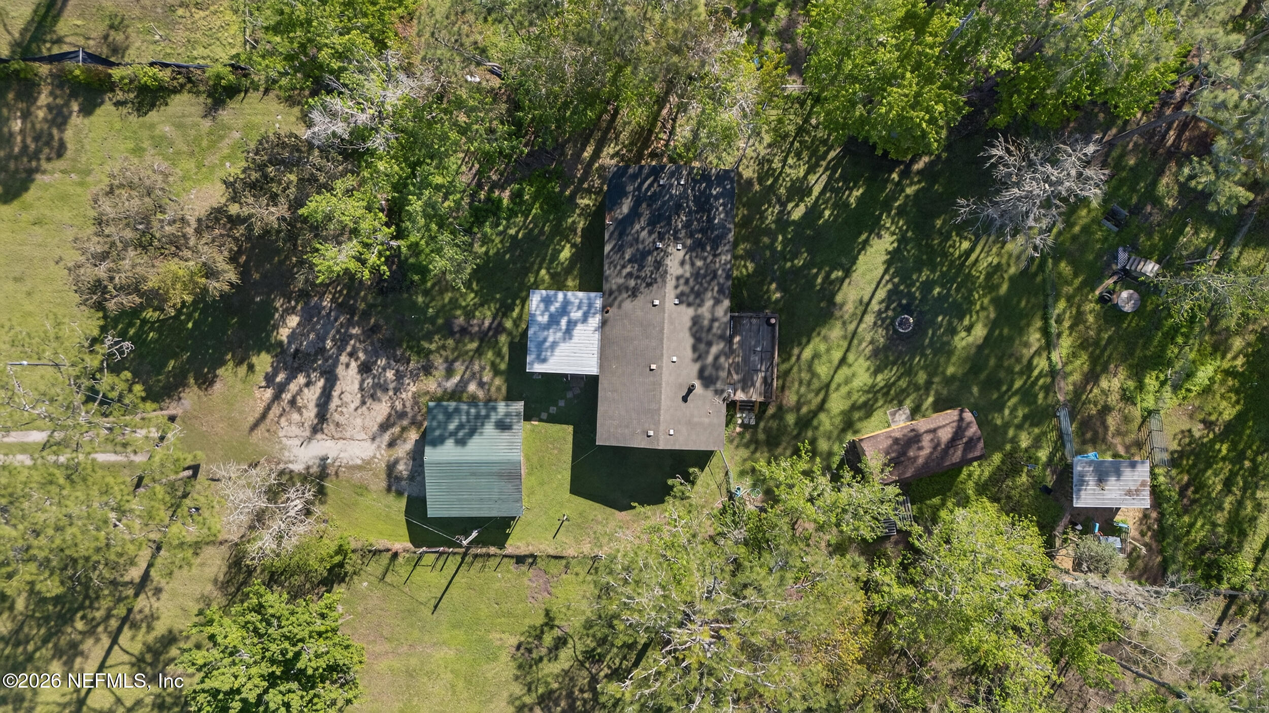 1755 Bennett Road St. Augustine, FL 32092 - Photo 31 of 34 an aerial view of a house with a yard