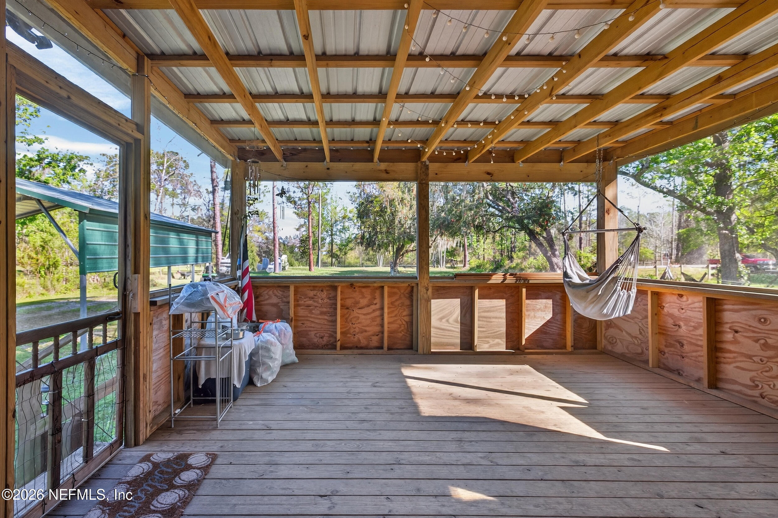 1755 Bennett Road St. Augustine, FL 32092 - Photo 6 of 34 a view of living room with furniture and a large window