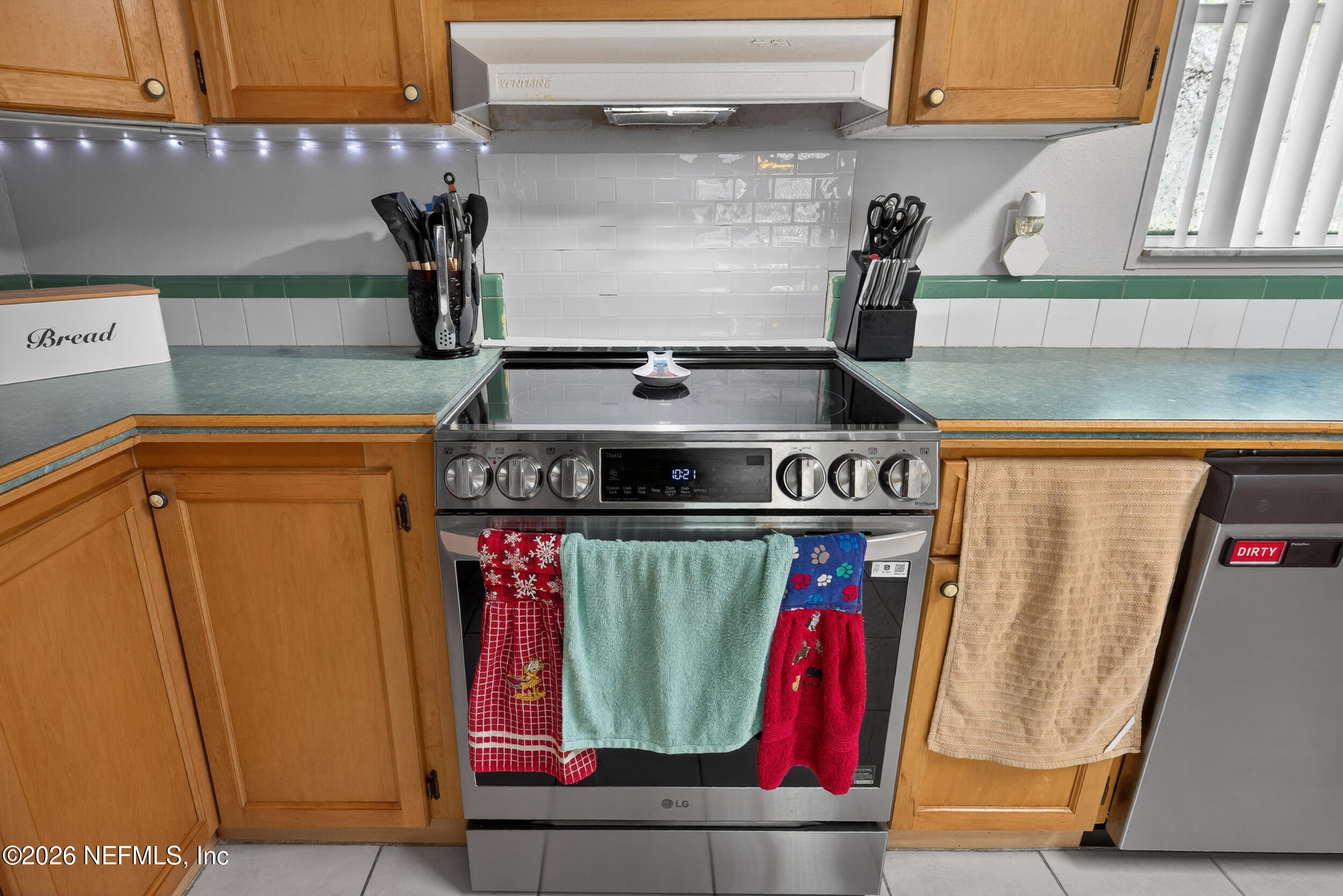 1755 Bennett Road St. Augustine, FL 32092 - Photo 10 of 34 a view of a refrigerator in a kitchen