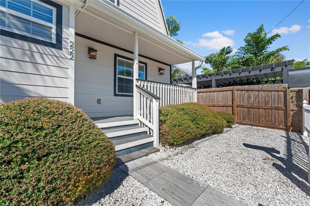 222 25th Street North St. Petersburg, FL 33713 - Photo 1 of 32 a view of a house with a garden