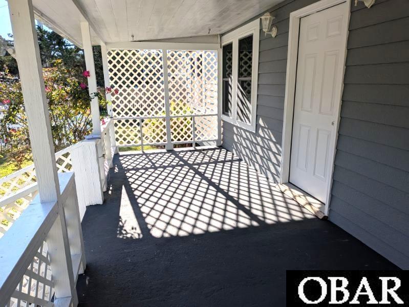 106 Cedar Road, Unit 84 & 85 Ocracoke, NC 27960 - Photo 30 of 33 Front Covered Porch