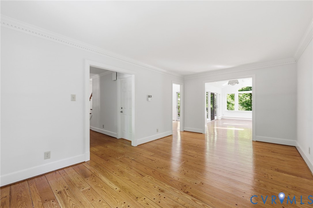 3201 East Brigstock Road Midlothian, VA 23113 - Photo 22 of 72 an empty room with wooden floor and windows