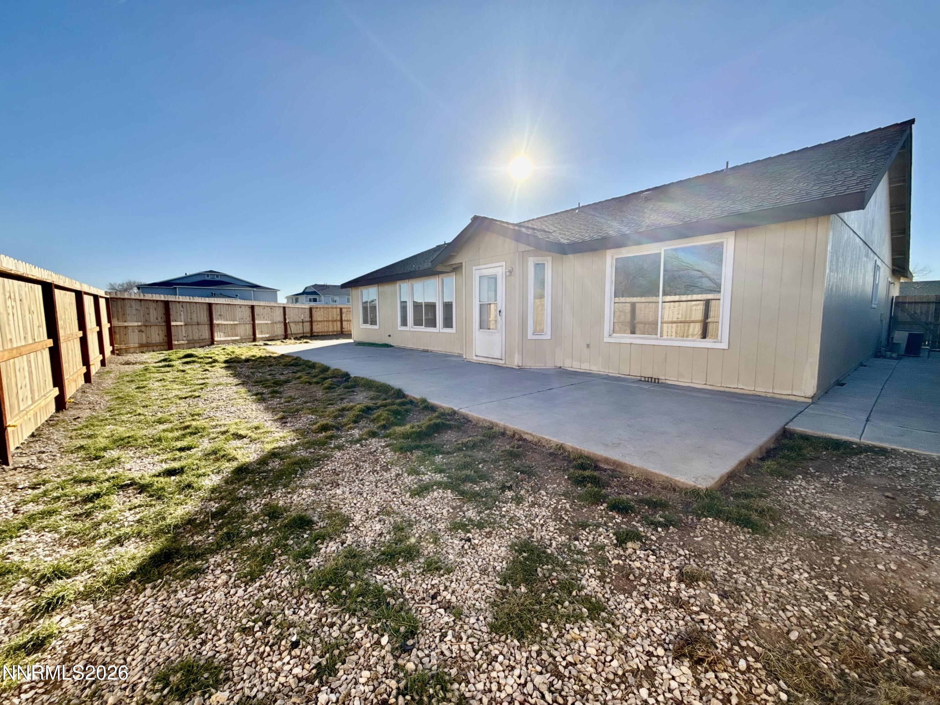 604 Keppel Street Fallon, NV 89406 - Photo 27 of 30 a view of a house with a yard