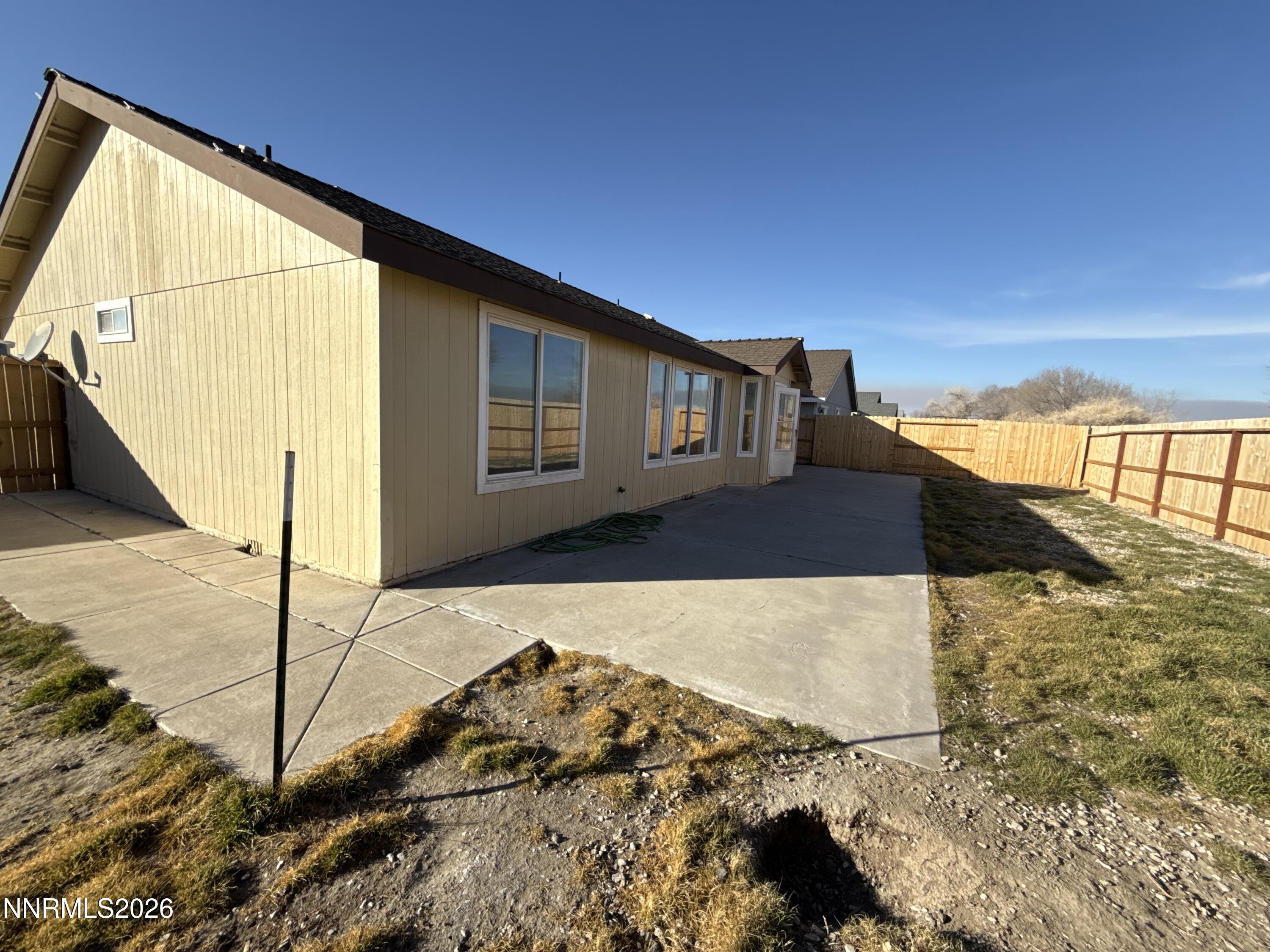 604 Keppel Street Fallon, NV 89406 - Photo 29 of 30 a front view of a house with a yard
