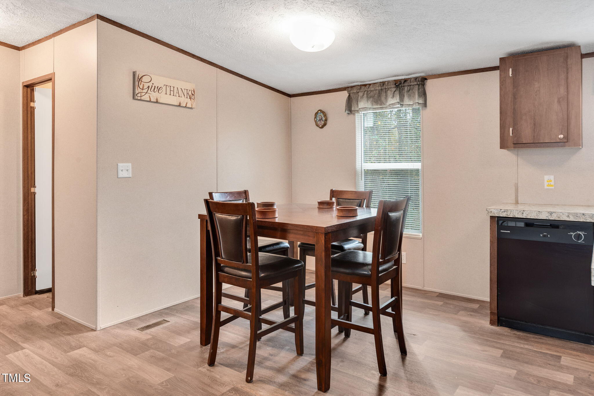 126 Ridge Road Angier, NC 27501 - Photo 12 of 30 a view of a dining room with furniture