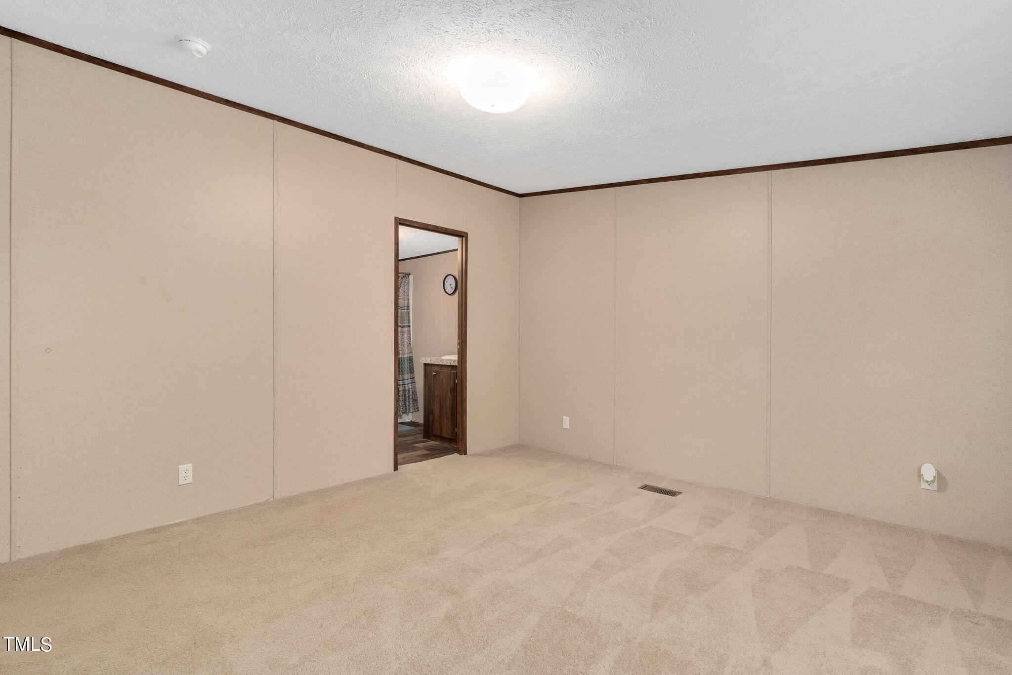 126 Ridge Road Angier, NC 27501 - Photo 18 of 30 a view of an empty room