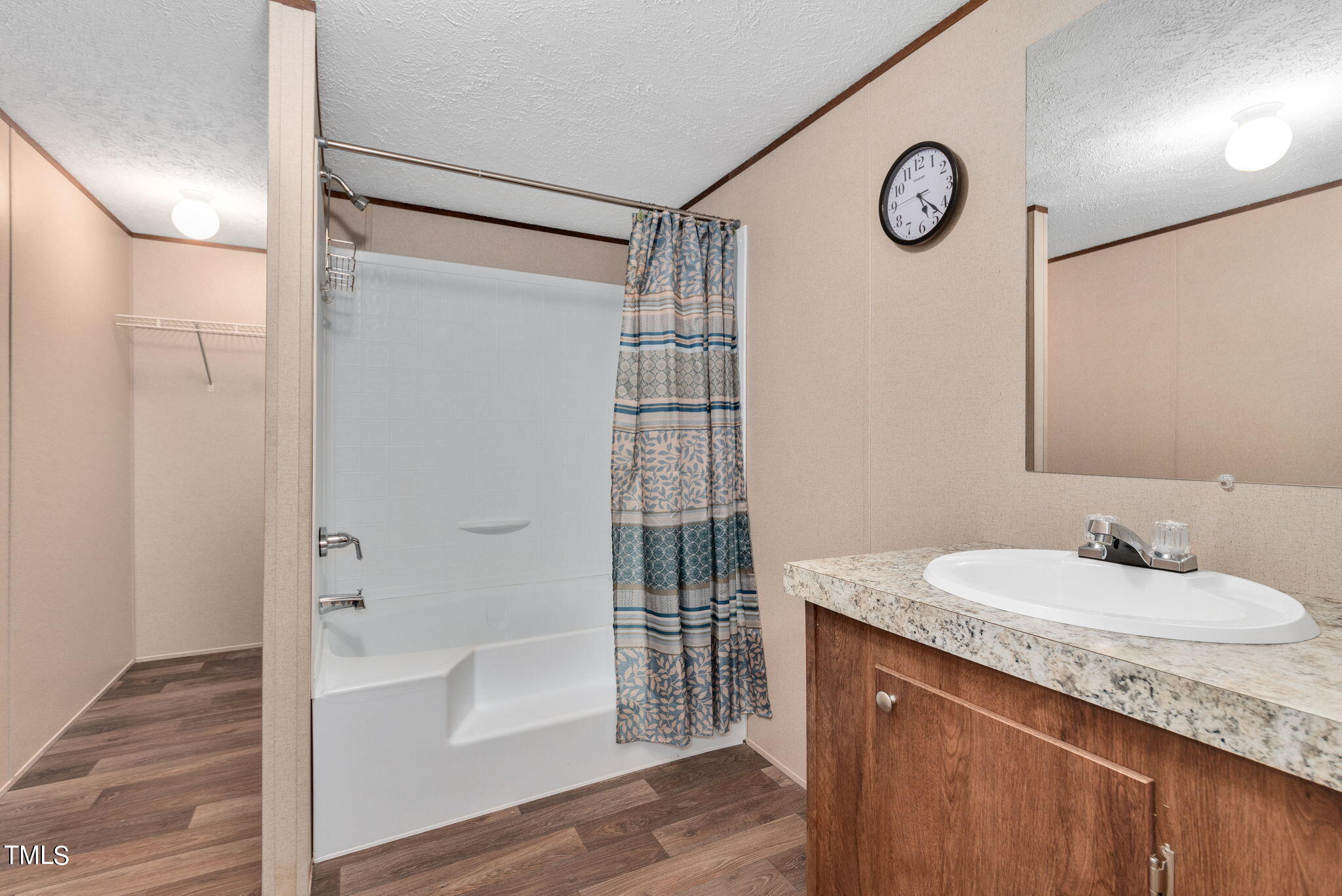 126 Ridge Road Angier, NC 27501 - Photo 19 of 30 a bathroom with a sink and a mirror