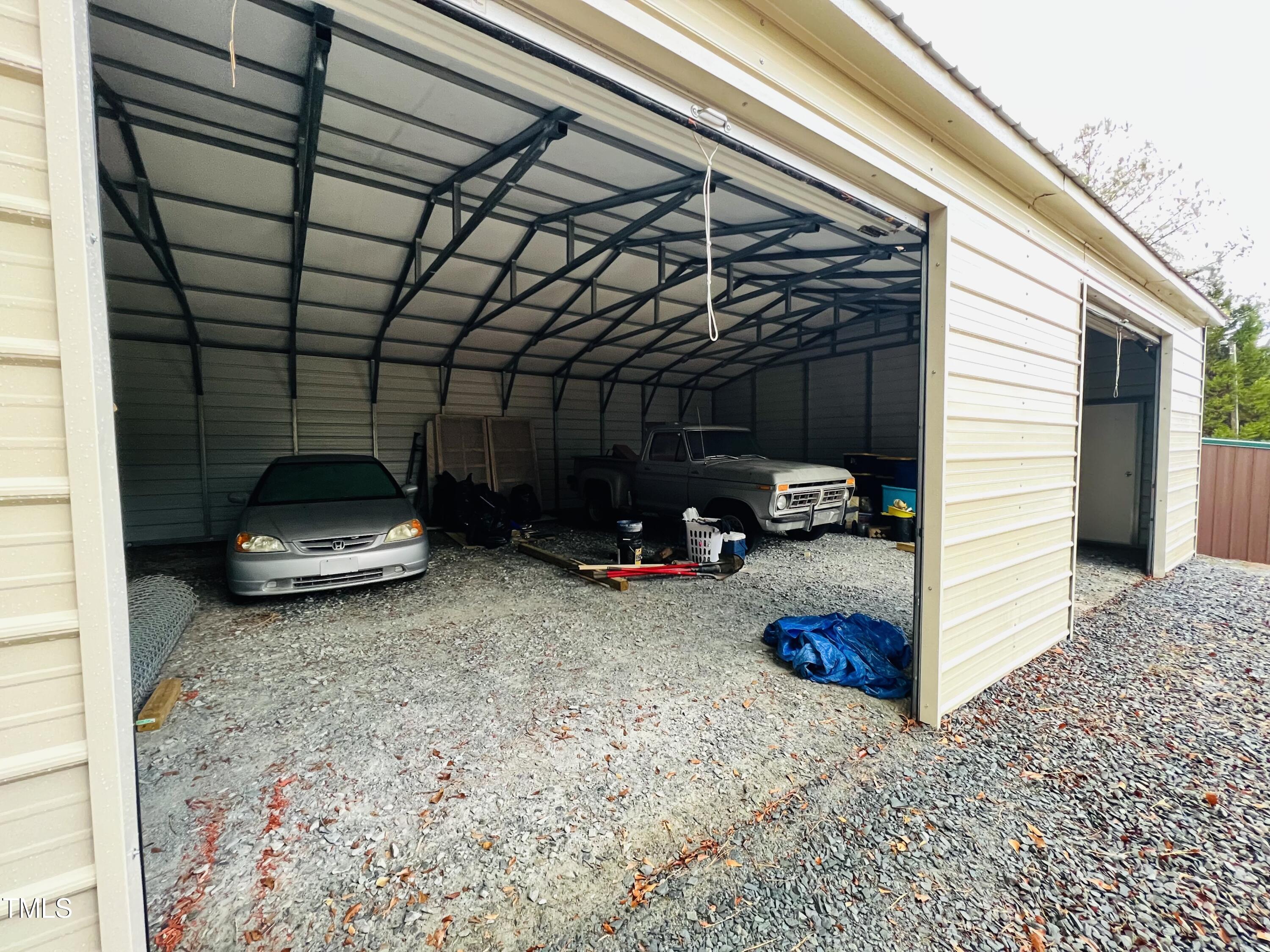 126 Ridge Road Angier, NC 27501 - Photo 25 of 30 a car parked in parking