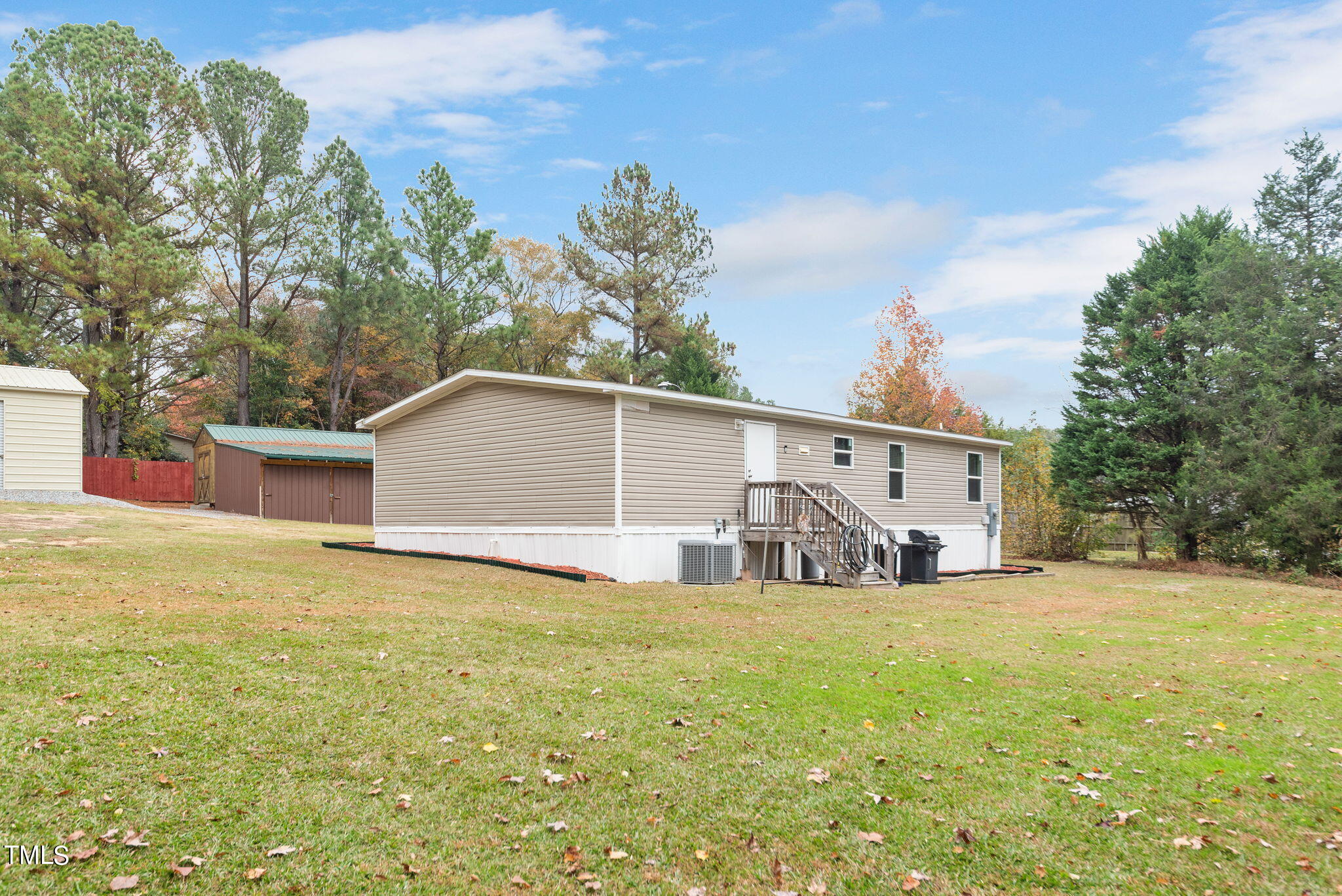 126 Ridge Road Angier, NC 27501 - Photo 6 of 30 a view of a house with a yard
