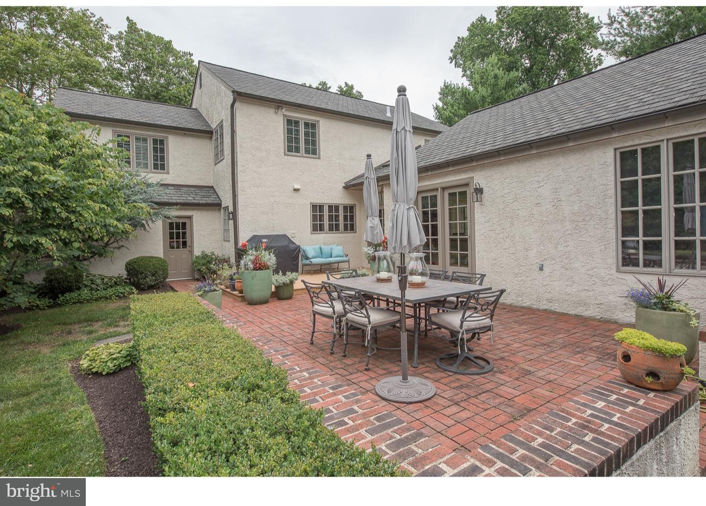 414 Gilpin Road Narberth, PA 19072 - Photo 23 of 25 a view of a house with backyard and sitting area