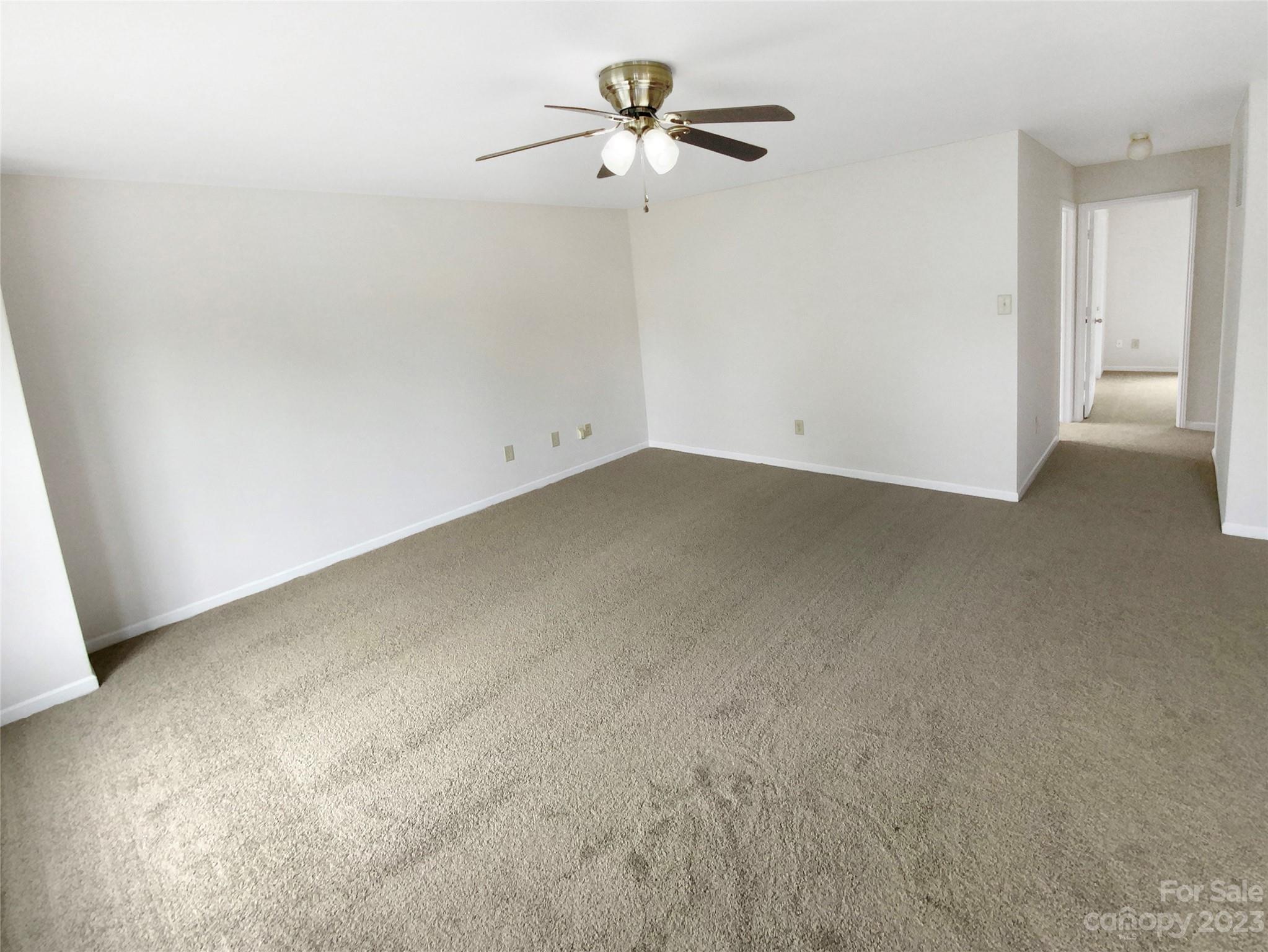 2518 Spring Breeze Way Monroe, NC 28110 - Photo 16 of 22 a view of a room with a ceiling fan
