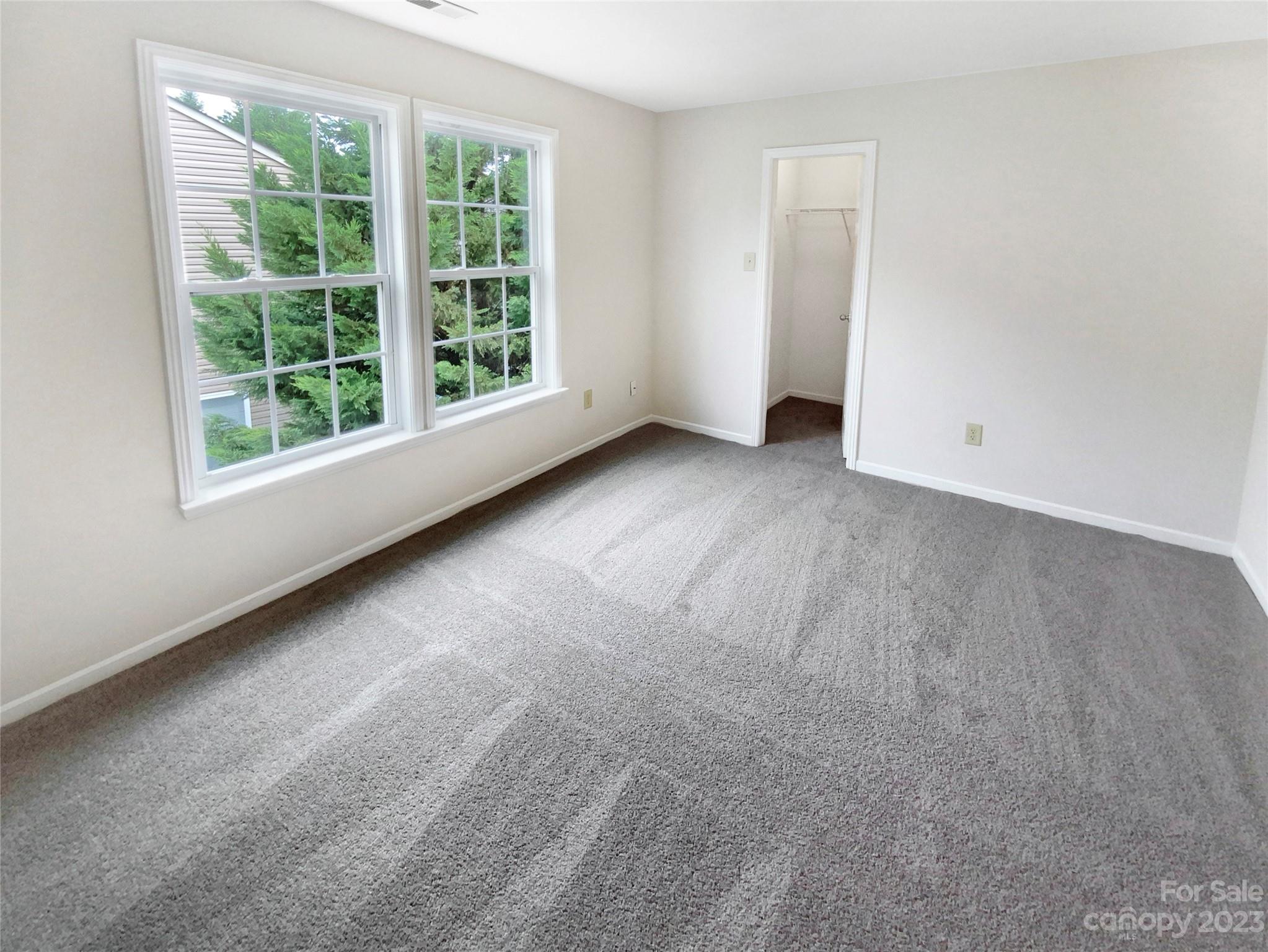2518 Spring Breeze Way Monroe, NC 28110 - Photo 18 of 22 an empty room with a window