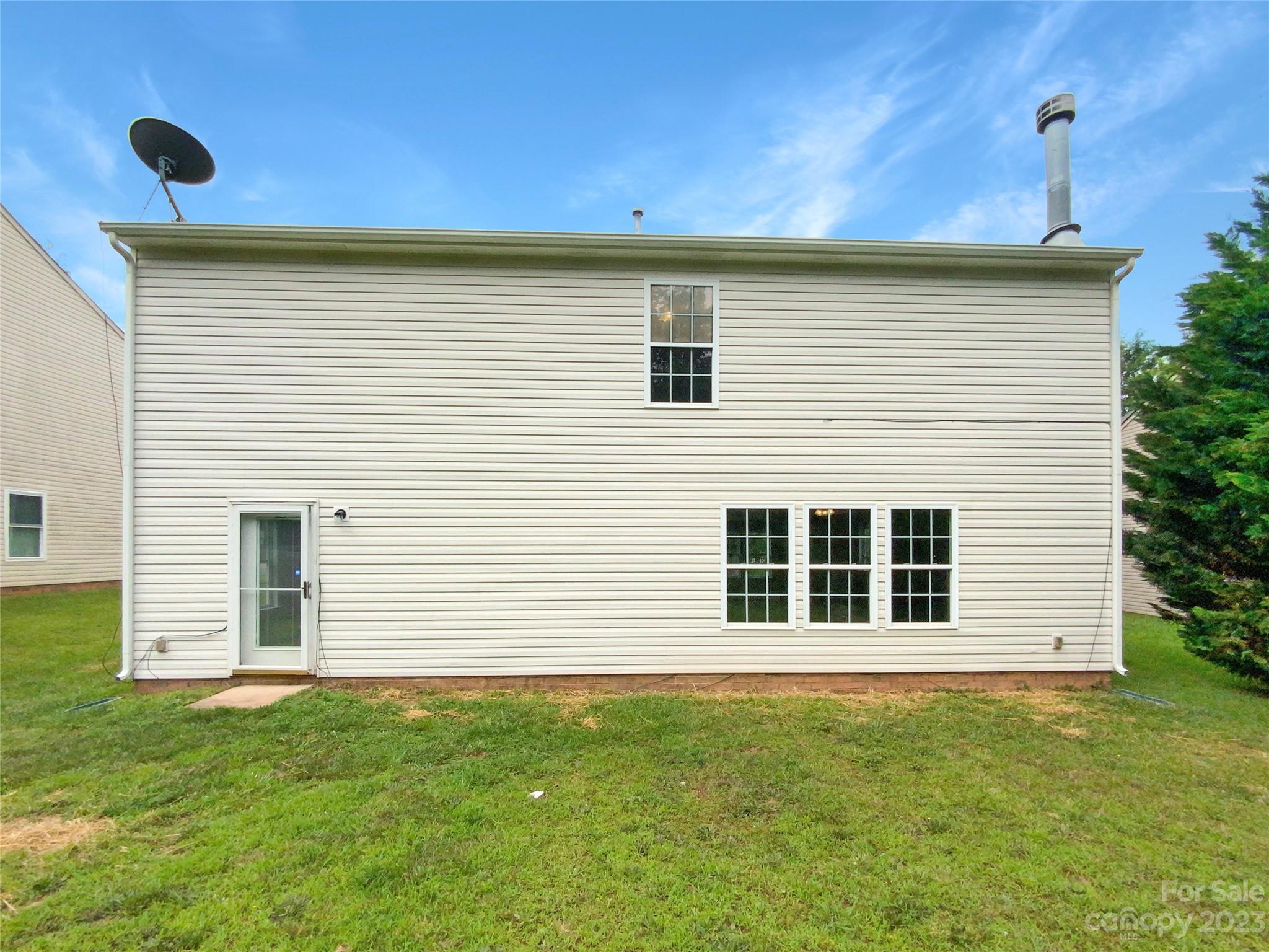 2518 Spring Breeze Way Monroe, NC 28110 - Photo 21 of 22 a view of a house with a backyard