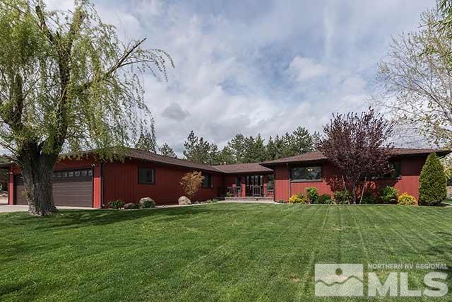 16009 Edmands Drive Reno, NV 89511 - Photo 1 of 1 a front view of house with yard and green space