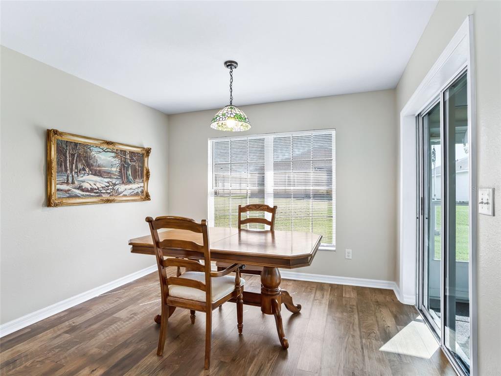 12321 Southeast 176th Loop Summerfield, FL 34491 - Photo 16 of 51 a dining room with furniture and window
