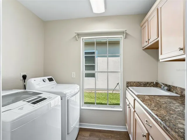 a utility room with dryer and washer