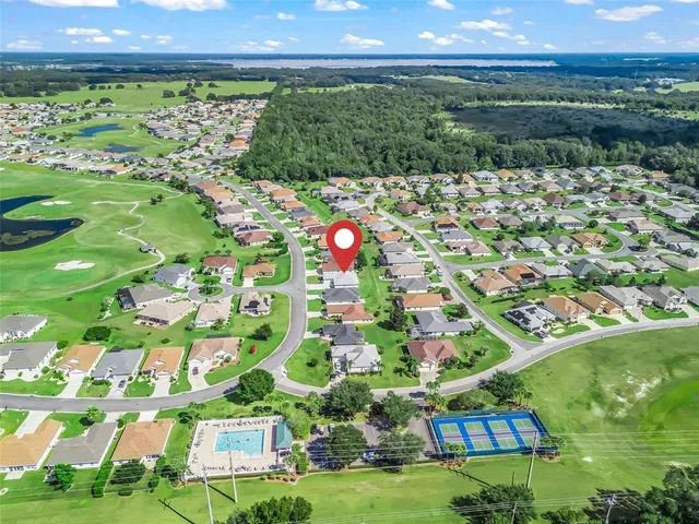 an aerial view of a house with a garden