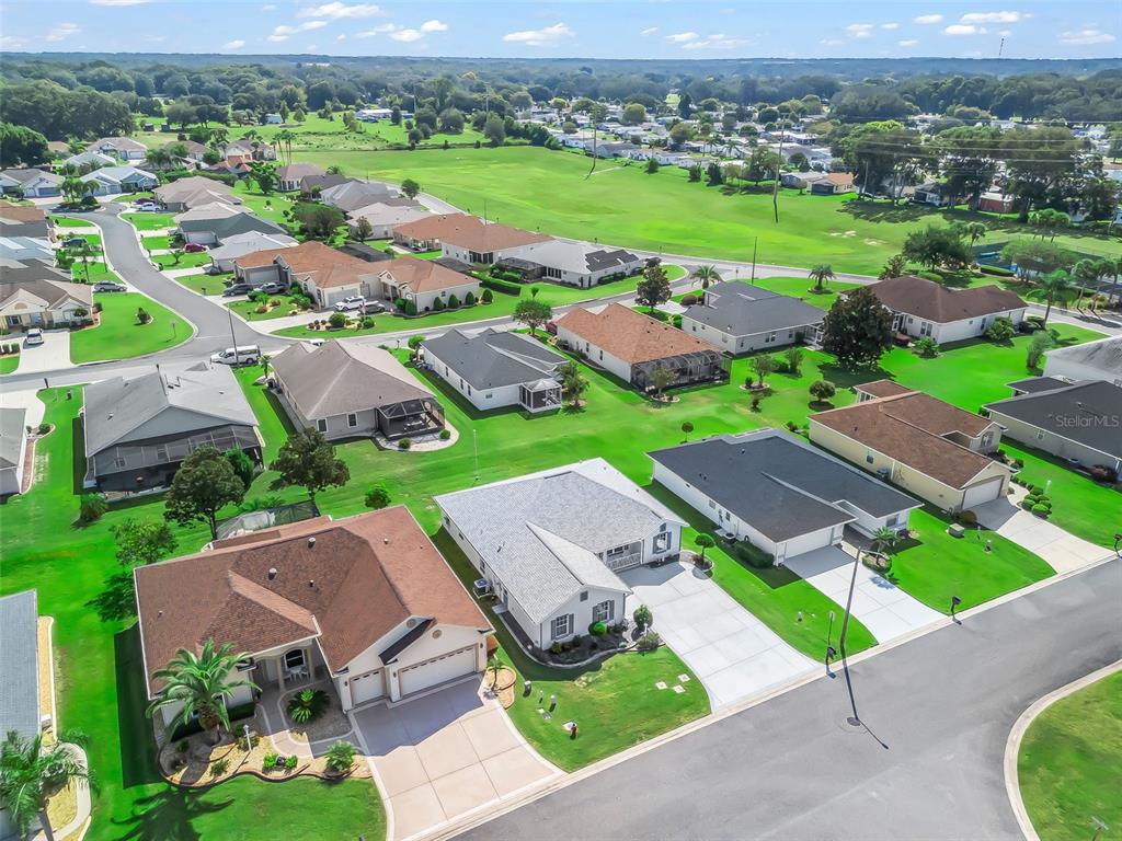 12321 Southeast 176th Loop Summerfield, FL 34491 - Photo 40 of 51 an aerial view of a house with a garden