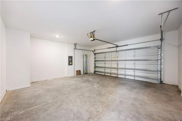 a view of room that has white walls