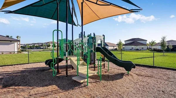 a view of a park with a slide