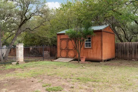 a backyard of a house with entertaining space