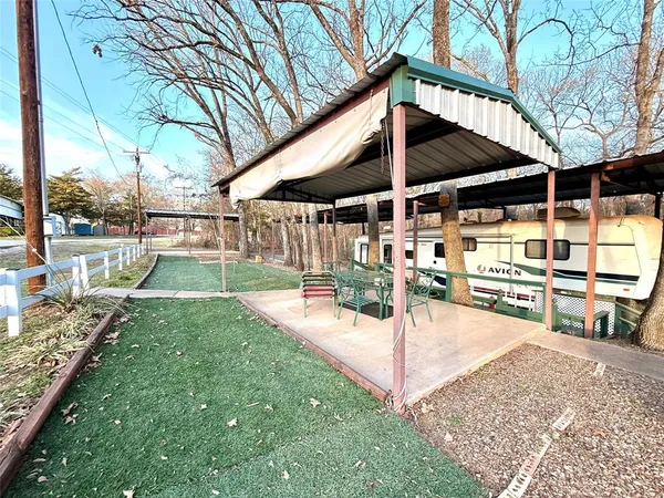 a view of a backyard of a house