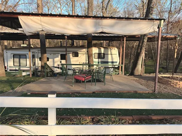 a view of a building with a porch