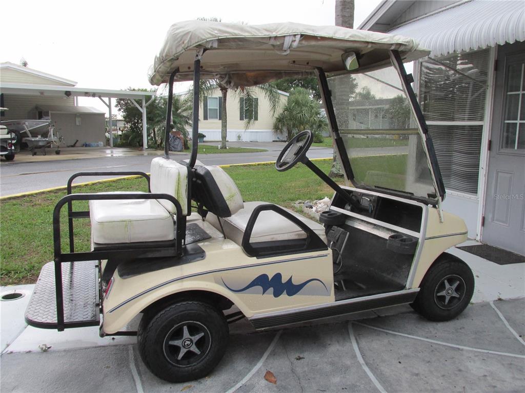 24 Saddle Bag Road Lake Wales, FL 33898 - Photo 14 of 18 This golf cart goes with the home!