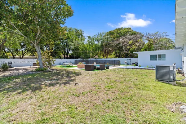 a view of house with outdoor space