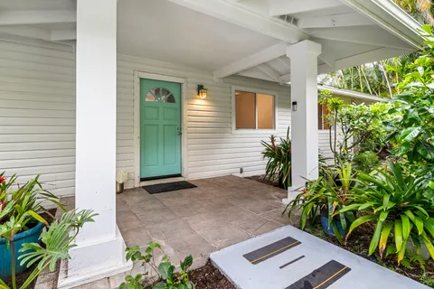 a view of a back yard from a porch