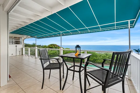 a view of an outdoor space with furniture