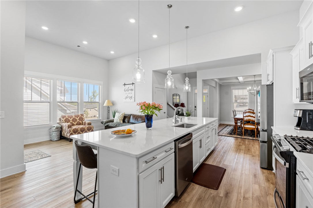 210 Maverick Trail Central, SC 29630 - Photo 14 of 41 This bright kitchen features an island, ample cabinet space, and sleek stainless steel appliances.