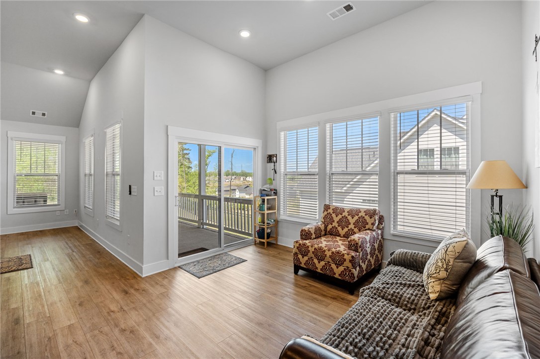 210 Maverick Trail Central, SC 29630 - Photo 15 of 41 This airy living space features abundant natural light and seamless indoor-outdoor flow.