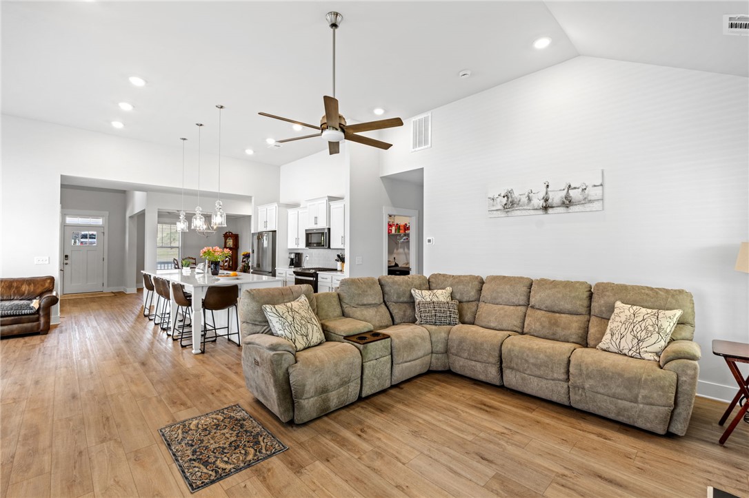 210 Maverick Trail Central, SC 29630 - Photo 20 of 41 This inviting space features an open layout with rich wood flooring and abundant natural light.