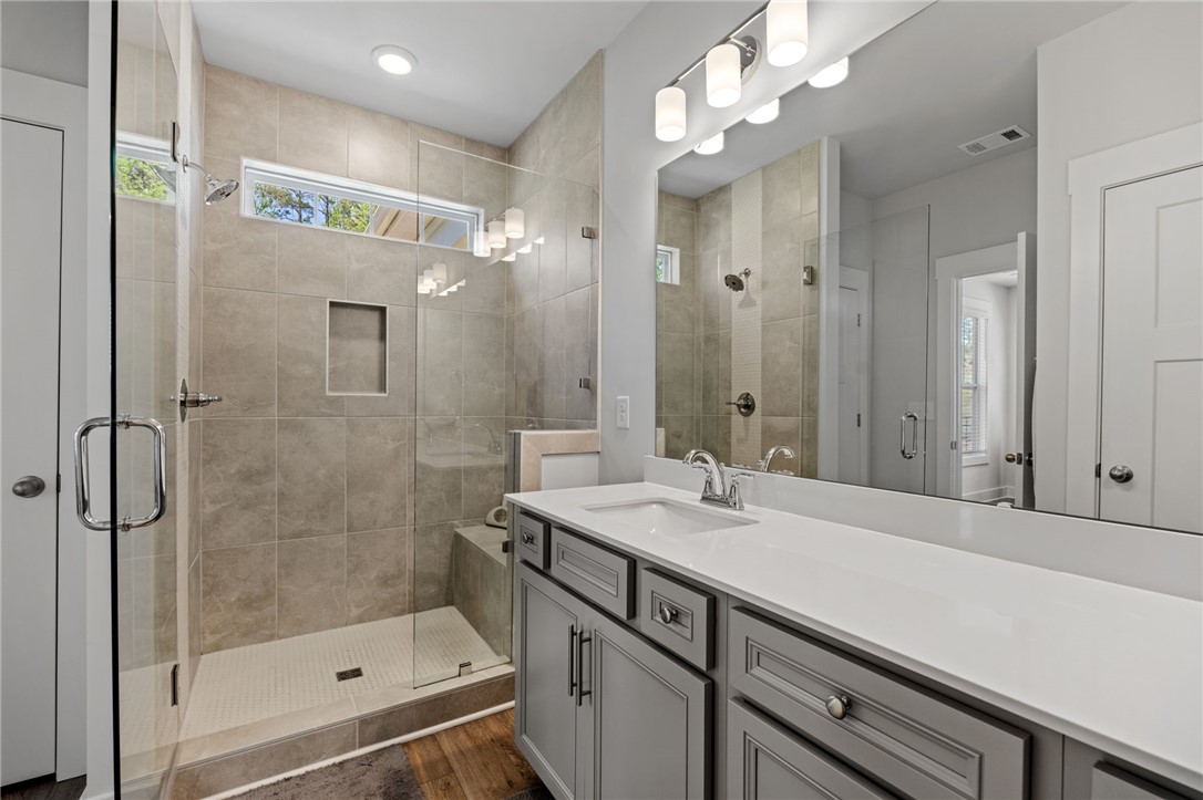 210 Maverick Trail Central, SC 29630 - Photo 23 of 41 This sleek bathroom features a spacious shower and a modern vanity, ideal for daily routines.