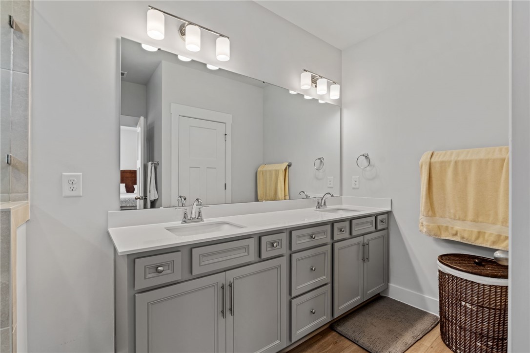 210 Maverick Trail Central, SC 29630 - Photo 24 of 41 This spacious bathroom offers dual vanities, providing both comfort and convenience.