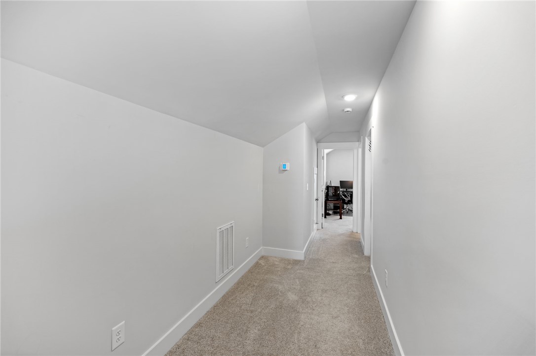 210 Maverick Trail Central, SC 29630 - Photo 27 of 41 This bright hallway connects spaces with clean lines and soft, inviting flooring.