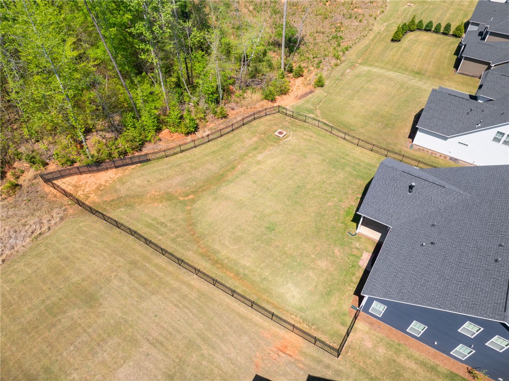 210 Maverick Trail Central, SC 29630 - Photo 36 of 41 This expansive, fenced yard offers a private retreat with lush green surroundings, perfect for outdoor living.