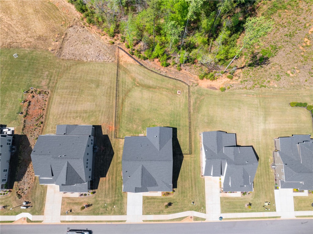 210 Maverick Trail Central, SC 29630 - Photo 40 of 41 An aerial view captures the neighborhood layout with pristine homes and expansive green spaces.