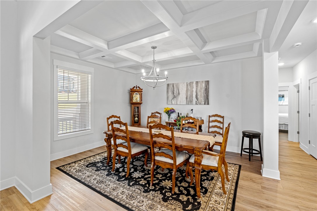 210 Maverick Trail Central, SC 29630 - Photo 7 of 41 This dining room boasts high ceilings with architectural detailing and rich hardwood floors.