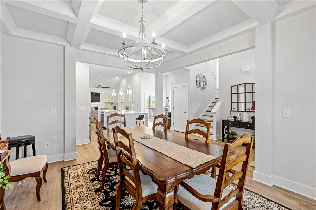 210 Maverick Trail Central, SC 29630 - Photo 9 of 41 This spacious dining area flows seamlessly into the kitchen and living room, perfect for entertaining.