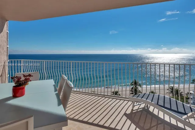 a view of a balcony with chair