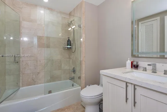 a work room with furniture and windows