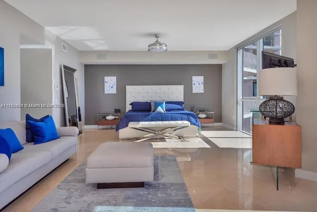 a living room with furniture and a couch