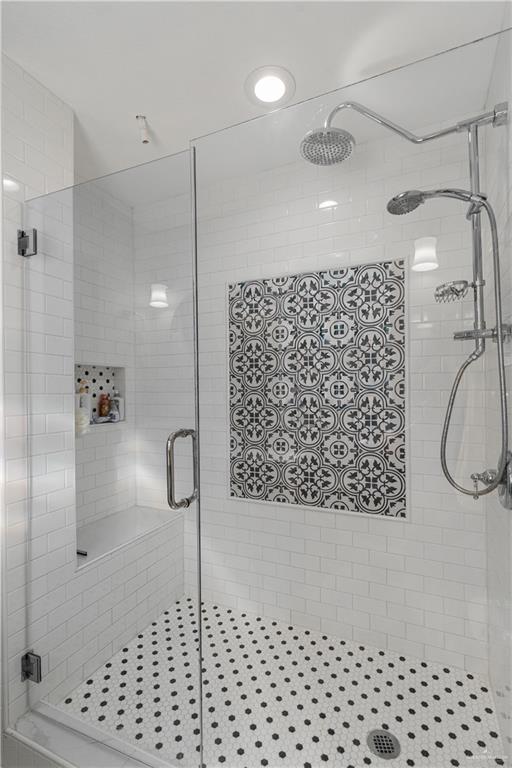 718 Hummingbird Avenue Pharr, TX 78577 - Photo 13 of 13 a bathroom with a shower