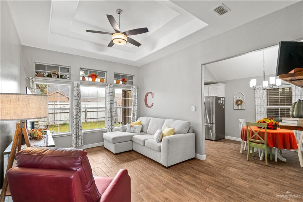 718 Hummingbird Avenue Pharr, TX 78577 - Photo 4 of 13 a living room with furniture and a large window