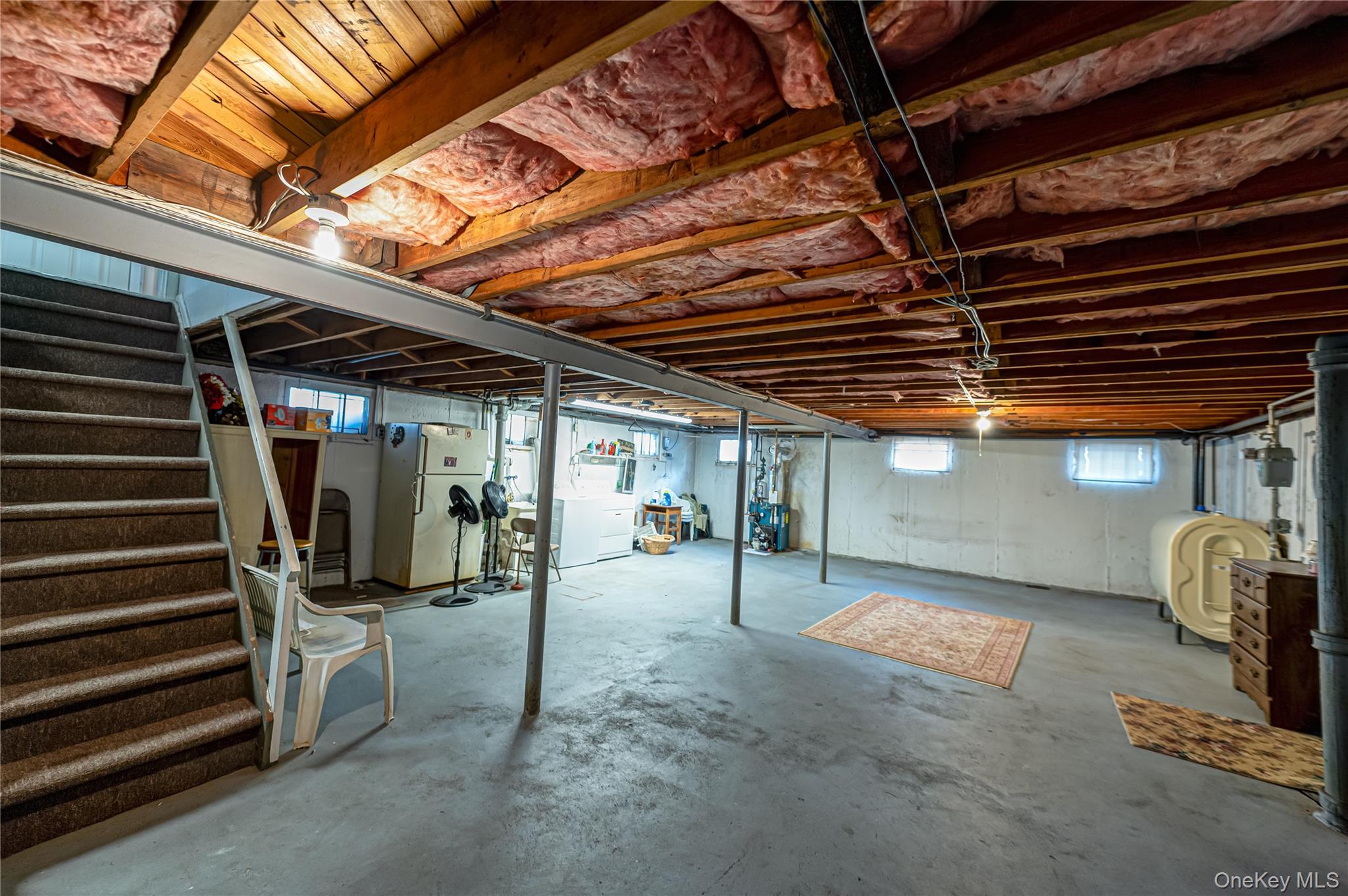 23 Olga Lane Commack, NY 11725 - Photo 12 of 17 a view of an empty room with wooden floor