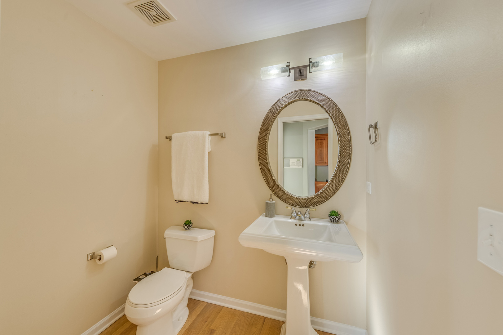 243 Boxcar Avenue Naperville, IL 60540 - Photo 17 of 29 a bathroom with a sink and a mirror