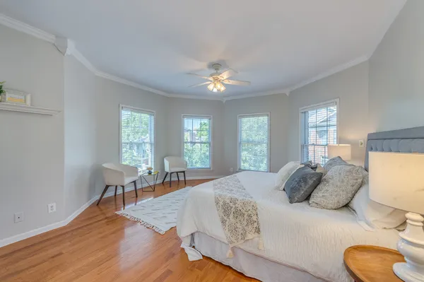 a bedroom with a bed and window