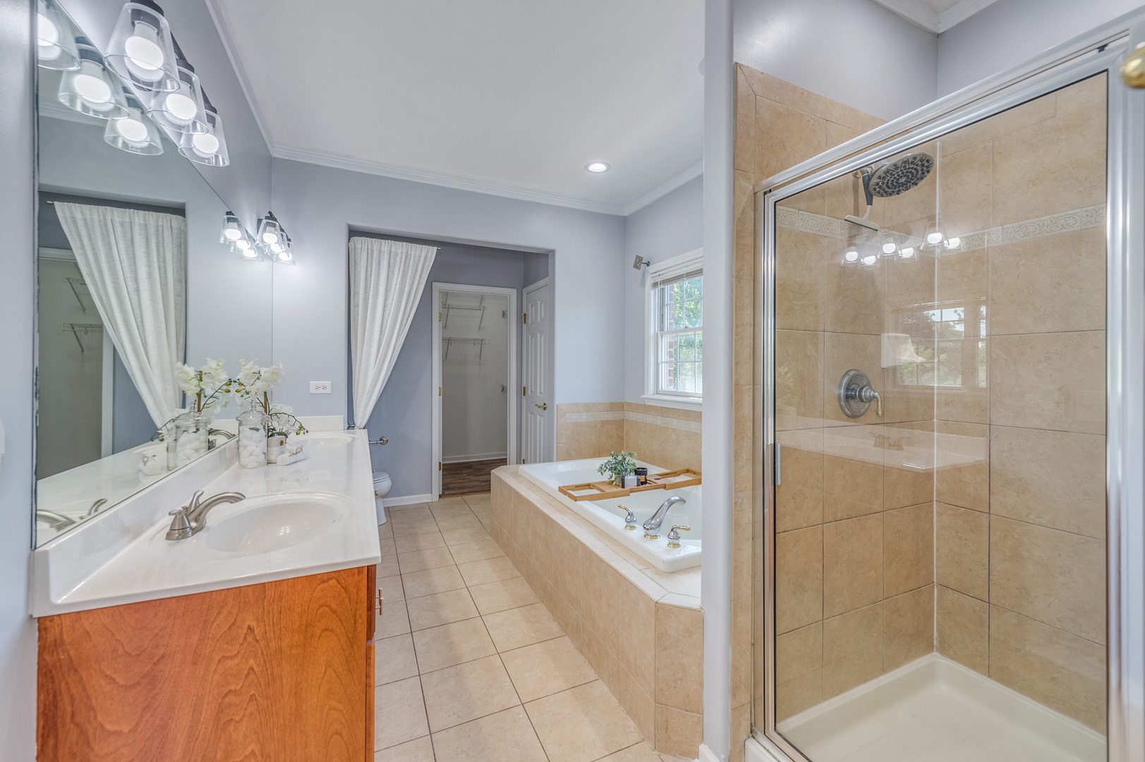 243 Boxcar Avenue Naperville, IL 60540 - Photo 20 of 29 a bathroom with a sink and a mirror